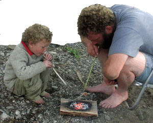 Tom and Edwin Elpel making a coal-burned bowl.