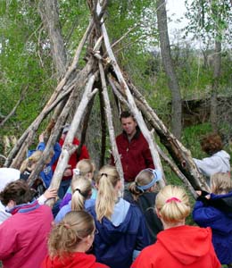 Twin Bridges students build a wickiup.