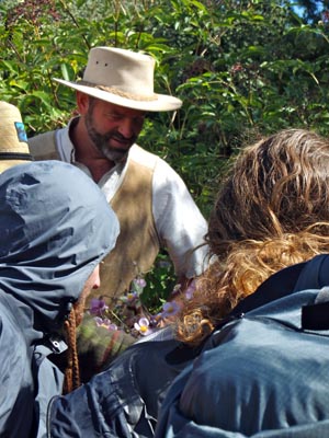 Photo of Tom Elpel teaching a plant class.